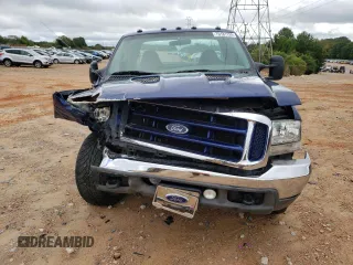 1999 Ford F-250 XL with VIN 1FTNX20L8XEB15501, listed as a Copart auction lot 70181124 with 125,476 mi miles and Salvage title. Bid and sale history available at DreamBid. Image 5.