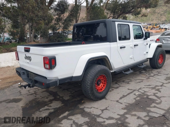 2021 Jeep Gladiator Willys with VIN 1C6HJTAG1ML572638, listed as a IAAI auction lot 42065562 with 43,040 mi miles and . Bid and sale history available at DreamBid. Image 4.
