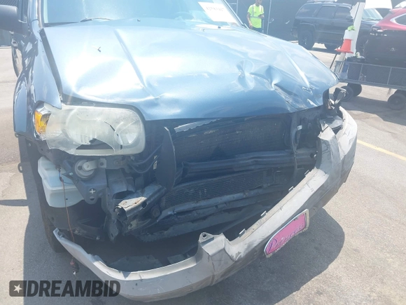 2006 Ford Escape XLT z VIN 1FMCU93156KB10612, wystawiony jako IAAI lot #42583417 z przebiegiem 133 615 mil mil oraz . Historia ofert i sprzedaży dostępna na DreamBid. Obrazek 6.