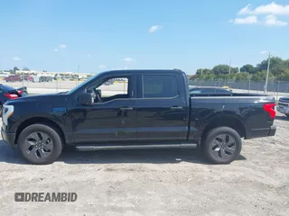 2024 Ford F-150 Lightning XLT with VIN 1FTVW3LK8RWG20320, listed as a IAAI auction lot 41960103 with Not provided miles and . Bid and sale history available at DreamBid. Image 13.