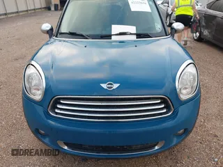 2012 MINI Countryman with VIN WMWZB3C56CWM06101, listed as a IAAI auction lot 42223616 with 149,680 mi miles and . Bid and sale history available at DreamBid. Image 6.
