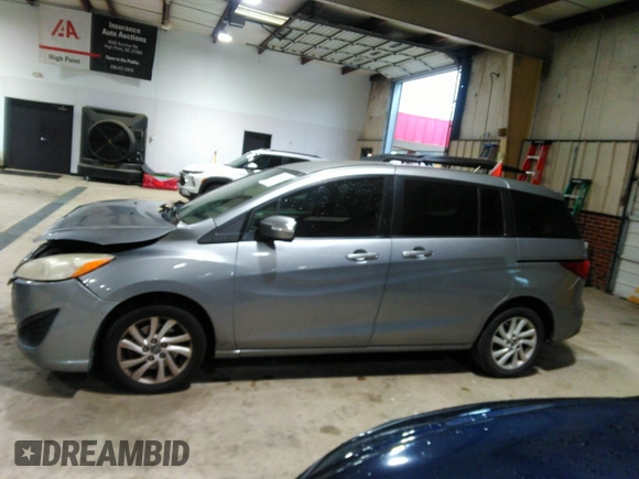 2013 Mazda 5 Sport with VIN JM1CW2BL5D0156684, listed as a IAAI auction lot 41966696 with 121,654 mi miles and . Bid and sale history available at DreamBid. Image 15.