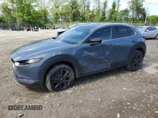 2022 Mazda CX-30 S Carbon Edition z VIN 3MVDMBCL2NM428792, wystawiony jako Copart lot #55077995 z przebiegiem 66 104 mil mil oraz Szkoda całkowita • Salvage title. Historia ofert i sprzedaży dostępna na DreamBid. Obrazek 1.
