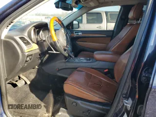 2013 Jeep Grand Cherokee Overland with VIN 1C4RJFCT8DC523252, listed as a Copart auction lot 48706965 with 173,325 mi miles and Salvage Title. Bid and sale history available at carsss.com. Image 7.