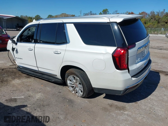 2022 GMC Yukon SLT with VIN 1GKS1BKT7NR329018, listed as a IAAI auction lot 41181065 with 50,551 mi miles. Bid and sale history available at carsss.com. Image 3.