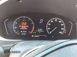 2023 Honda Civic Sport with VIN 2HGFE2F51PH513811, listed as a IAAI auction lot 41701450 with 33,933 mi miles and . Bid and sale history available at DreamBid. Image 7.