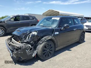 2017 MINI Hardtop Cooper S with VIN WMWXP7C52H2A44625, listed as a Copart auction lot 58011895 with 79,238 mi miles and Salvage title. Bid and sale history available at DreamBid. Image 1.