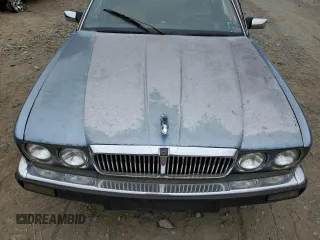 1989 Jaguar XJ with VIN SAJHY1540KC578115, listed as a Copart auction lot 69142274 with Not Provided miles and Clean Title. Bid and sale history available at DreamBid. Image 11.