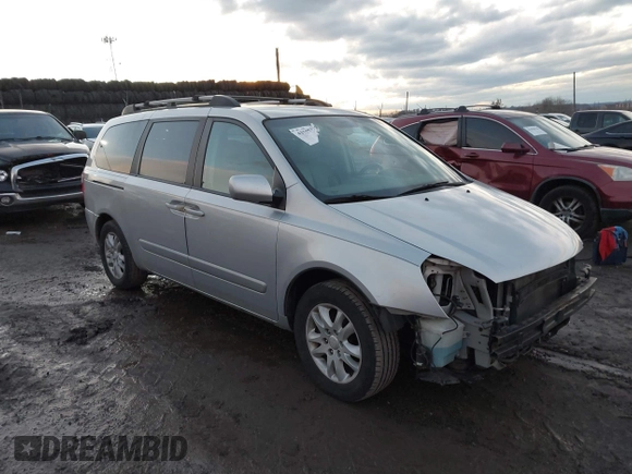 2007 Kia Sedona LX with VIN KNDMB233976172127, listed as a IAAI auction lot 41557356 with 164,383 mi miles. Bid and sale history available at carsss.com. Image 1.