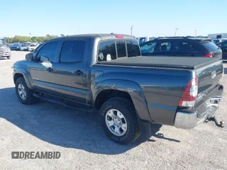 2009 Toyota Tacoma PreRunner with VIN 3TMJU62N59M088137, listed as a IAAI auction lot 41775410 with 217,331 mi miles. Bid and sale history available at carsss.com. Image 3.