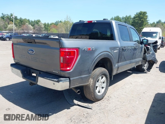 2022 Ford F-150 XL with VIN 1FTFW1E87NFB86556, listed as a IAAI auction lot 42157650 with 54,726 mi miles and . Bid and sale history available at DreamBid. Image 4.