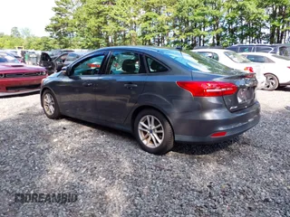 2018 Ford Focus SE z VIN 1FADP3FE0JL284107, wystawiony jako IAAI lot #42815845 z przebiegiem 110 155 mil mil oraz . Historia ofert i sprzedaży dostępna na DreamBid. Obrazek 3.