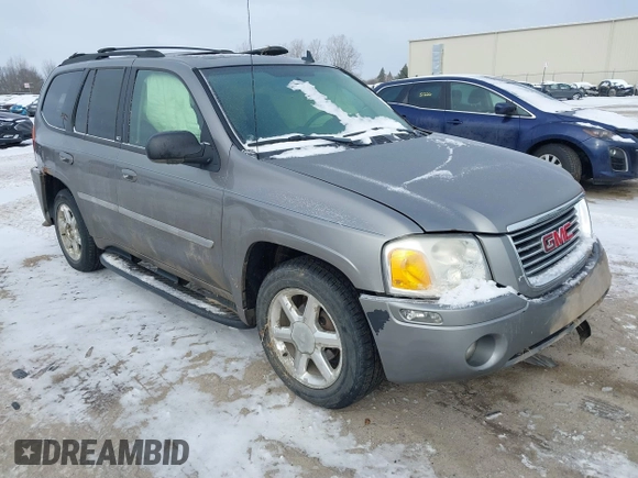 2007 GMC Envoy SLE with VIN 1GKDT13S072246688, listed as a IAAI auction lot 41258265 with 218,001 mi miles. Bid and sale history available at carsss.com. Image 1.