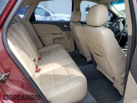 2008 Mercury Sable Premier z VIN 1MEHM42W98G611971, wystawiony jako Copart lot #59506965 z przebiegiem 149 058 mil mil oraz Szkoda całkowita • Salvage title. Historia ofert i sprzedaży dostępna na DreamBid. Obrazek 11.