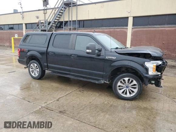 2018 Ford F-150 XL with VIN 1FTEW1EG0JFD10941, listed as a Copart auction lot 57855095 with 119,345 mi miles and Salvage title. Bid and sale history available at DreamBid. Image 4.