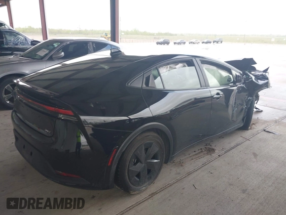 2024 Toyota Prius LE with VIN JTDACAAU3R3032357, listed as a IAAI auction lot 41914598 with 15,360 mi miles and . Bid and sale history available at DreamBid. Image 4.