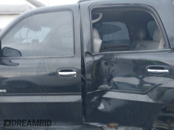 2002 Cadillac Escalade z VIN 1GYEK63N62R205809, wystawiony jako IAAI lot #41090723 z przebiegiem 180 631 mil mil oraz . Historia ofert i sprzedaży dostępna na DreamBid. Obrazek 14.