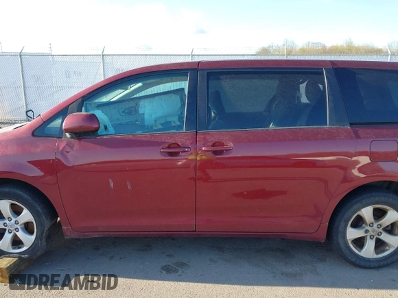 2012 Toyota Sienna with VIN 5TDKA3DC0CS013845, listed as a IAAI auction lot 42010389 with 209,272 mi miles and . Bid and sale history available at DreamBid. Image 15.