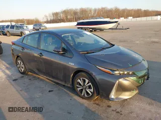 2018 Toyota Prius Plus with VIN JTDKARFP7J3077320, listed as a IAAI auction lot 41780069 with 121,509 mi miles and . Bid and sale history available at DreamBid. Image 1.