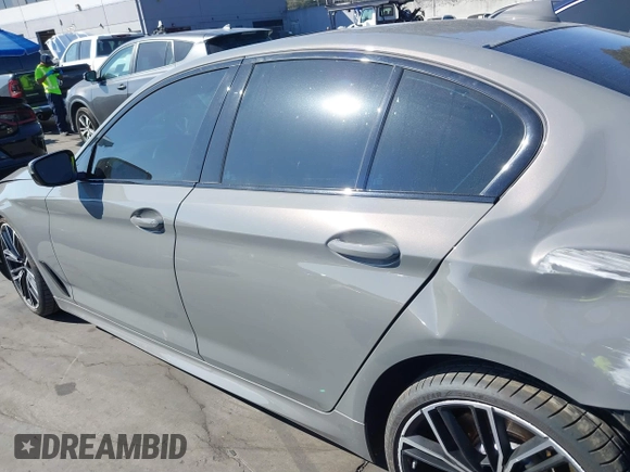 2022 BMW 5 Series M550i xDrive with VIN WBA13BK02NCJ61943, listed as a IAAI auction lot 41607980 with Not provided miles and . Bid and sale history available at DreamBid. Image 15.