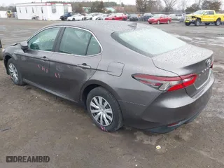 2021 Toyota Camry Hybrid LE with VIN 4T1C31AK4MU557997, listed as a IAAI auction lot 41863503 with 121,270 mi miles. Bid and sale history available at carsss.com. Image 3.