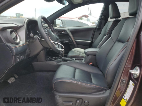 2018 Toyota RAV4 SE with VIN 2T3NFREV8JW444933, listed as a Copart auction lot 55832085 with 75,445 mi miles and Salvage title. Bid and sale history available at DreamBid. Image 7.