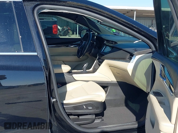 2019 Cadillac XT5 FWD with VIN 1GYKNARS7KZ117913, listed as a IAAI auction lot 41228767 with 105,335 mi miles and . Bid and sale history available at carsss.com. Image 5.