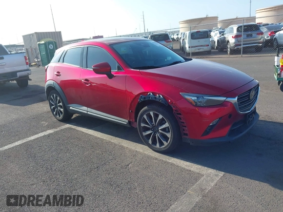 2019 Mazda CX-3 Grand Touring with VIN JM1DKFD71K0427650, listed as a IAAI auction lot 42058069 with 67,688 mi miles and . Bid and sale history available at DreamBid. Image 1.