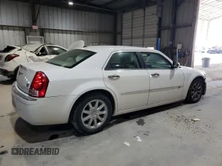 2010 Chrysler 300 with VIN 2C3CA6CT8AH329985, listed as a Copart auction lot 84556624 with 165,348 mi miles and Salvage Title. Bid and sale history available at carsss.com. Image 3.