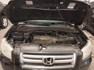 2007 Honda Pilot EX-L with VIN 5FNYF18677B017230, listed as a IAAI auction lot 41727853 with 257,527 mi miles and . Bid and sale history available at DreamBid. Image 10.