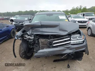 2018 Volkswagen Atlas SE z VIN 1V2KR2CAXJC517240, wystawiony jako IAAI lot #42361370 z przebiegiem 129 546 mil mil oraz . Historia ofert i sprzedaży dostępna na DreamBid. Obrazek 13.