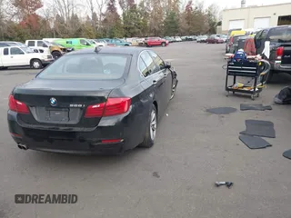 2014 BMW 5 Series 528i with VIN WBA5A5C5XED502261, listed as a IAAI auction lot 41418334 with 139,983 mi miles. Bid and sale history available at carsss.com. Image 4.