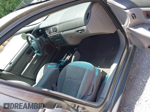 2005 Ford Taurus SE с VIN 1FAHP53205A262987, выставлен на аукционе IAAI как лот 42580079 с пробегом 104 996 миль миль и . История ставок и продаж доступна на DreamBid. Изображение 5.