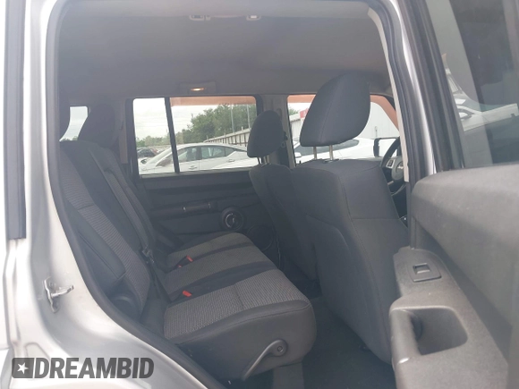 2010 Jeep Commander Sport with VIN 1J4RH4GKXAC157379, listed as a IAAI auction lot 42130174 with 193,337 mi miles and . Bid and sale history available at DreamBid. Image 8.