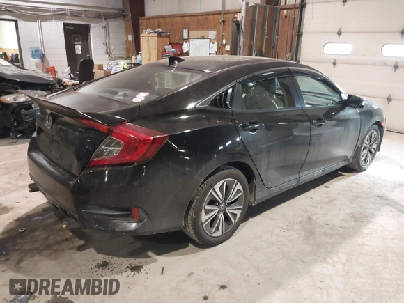 2016 Honda Civic Sedan EX-L with VIN 19XFC1F75GE210803, listed as a IAAI auction lot 41424370 with 111,848 mi miles. Bid and sale history available at carsss.com. Image 4.