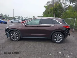 2020 Infiniti QX50 Luxe with VIN 3PCAJ5M17LF103598, listed as a IAAI auction lot 41406324 with 51,490 mi miles and . Bid and sale history available at DreamBid. Image 14.