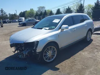 2015 Lincoln MKT EcoBoost with VIN 2LMHJ5AT4FBL00959, listed as a IAAI auction lot 41991763 with 159,687 mi miles and . Bid and sale history available at DreamBid. Image 17.