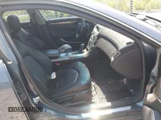2011 Cadillac CTS with VIN 1G6DC5EY0B0163841, listed as a IAAI auction lot 42409886 with 119,231 mi miles and . Bid and sale history available at DreamBid. Image 5.