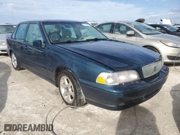 1998 Volvo S70 z VIN YV1LS5675W3511553, wystawiony jako Copart lot #75102454 z przebiegiem Nie podano mil oraz Szkody całkowita. Historia ofert i sprzedaży dostępna na DreamBid. Obrazek 4.