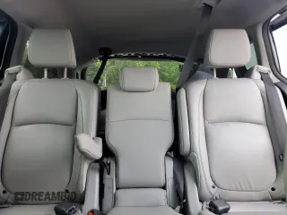 2021 Honda Odyssey Touring z VIN 5FNRL6H85MB039444, wystawiony jako Copart lot #57142205 z przebiegiem 74 228 mil mil oraz Szkoda całkowita • Salvage title. Historia ofert i sprzedaży dostępna na DreamBid. Obrazek 10.