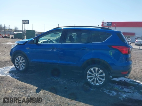 2019 Ford Escape SEL with VIN 1FMCU9HD2KUB52835, listed as a IAAI auction lot 41791321 with 80,468 mi miles and . Bid and sale history available at DreamBid. Image 14.