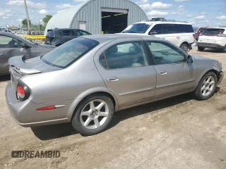 2000 Nissan Maxima GXE z VIN JN1CA31A9YT224416, wystawiony jako Copart lot #55514495 z przebiegiem 234 882 mil mil oraz Szkody całkowita. Historia ofert i sprzedaży dostępna na DreamBid. Obrazek 3.