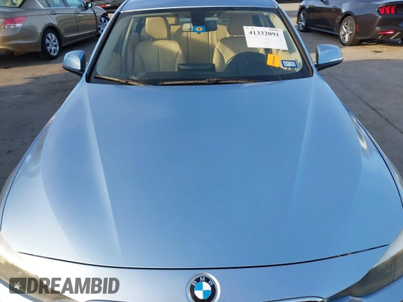 2013 BMW 3 Series 320i with VIN WBA3B1C56DK128089, listed as a IAAI auction lot 41332091 with 101,155 mi miles. Bid and sale history available at carsss.com. Image 5.