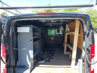 2015 Ford Transit Cargo z VIN 1FTBW2YG7FKA20201, wystawiony jako IAAI lot #42253463 z przebiegiem 83 235 mil mil oraz . Historia ofert i sprzedaży dostępna na DreamBid. Obrazek 21.