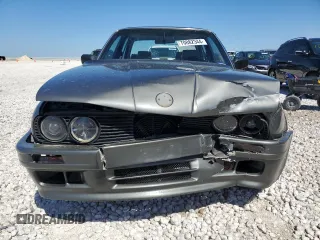 1987 BMW 3 Series 325i with VIN WBAAD2309H2446547, listed as a Copart auction lot 70882344 with 187,806 mi miles and Salvage Title. Bid and sale history available at carsss.com. Image 5.
