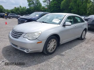 2009 Chrysler Sebring Touring z VIN 1C3LC56BX9N505929, wystawiony jako IAAI lot #42442908 z przebiegiem 114 012 mil mil oraz . Historia ofert i sprzedaży dostępna na DreamBid. Obrazek 2.