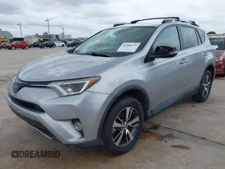 2017 Toyota RAV4 XLE with VIN 2T3WFREV3HW321796, listed as a IAAI auction lot 42080479 with 104,014 mi miles and . Bid and sale history available at DreamBid. Image 2.