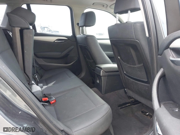 2013 BMW X1 28i with VIN WBAVM1C55DVW41609, listed as a IAAI auction lot 41604038 with 126,036 mi miles. Bid and sale history available at carsss.com. Image 8.