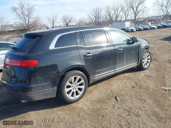 2013 Lincoln MKT EcoBoost with VIN 2LMHJ5AT6DBL55328, listed as a IAAI auction lot 41806881 with 72,740 mi miles. Bid and sale history available at carsss.com. Image 4.