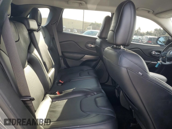 2021 Jeep Cherokee Latitude Lux z VIN 1C4PJMMX9MD213053, wystawiony jako Copart lot #50939575 z przebiegiem 37 403 mil mil oraz Szkoda całkowita • Salvage title. Historia ofert i sprzedaży dostępna na DreamBid. Obrazek 11.